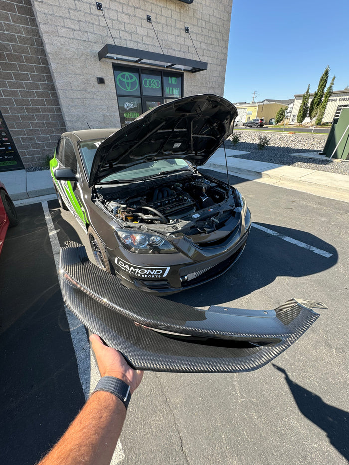 Gravedigger 07-09 Mazdaspeed 3 Carbon Fiber Badgeless Grille by Graveyard Performance available at Damond Motorsports